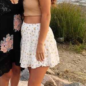 White skirt with flower designs